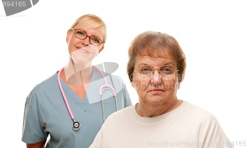 Image of Concerned Senior Woman with Doctor Behind
