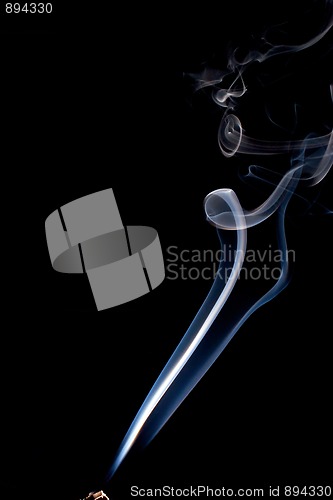 Image of real incense smoke against black