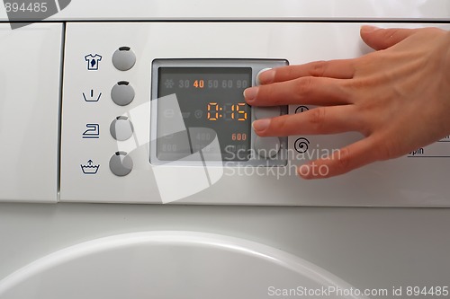 Image of Adjusting a washing machine