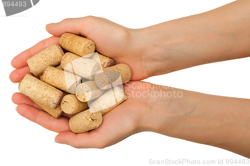 Image of Hands with wine corks