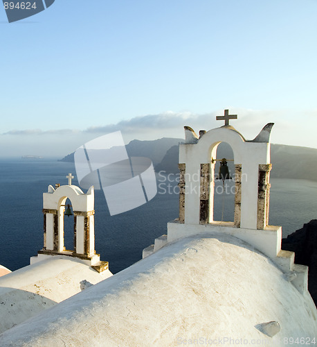 Image of greek island twin bell tower church over the caldera oia santori