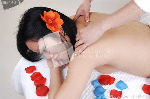 Image of Chinese girl getting massage.