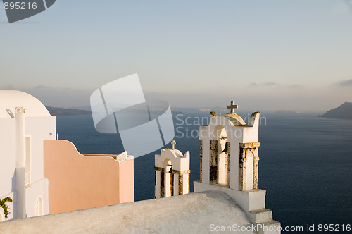 Image of greek island twin bell tower church over the caldera oia santori