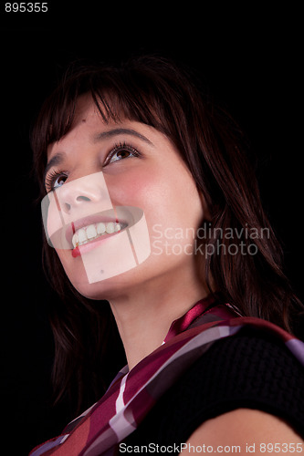 Image of Beautiful Woman Smiling looking up