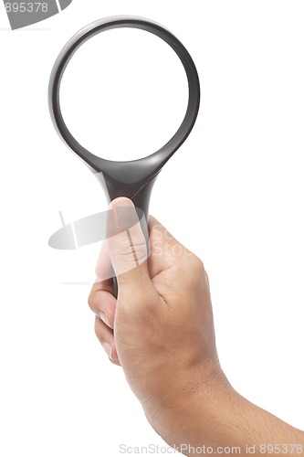 Image of Hand with magnifying glass