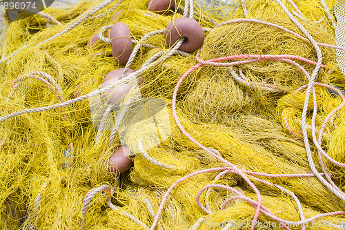 Image of Fishing tackle: net, float, rope close-up