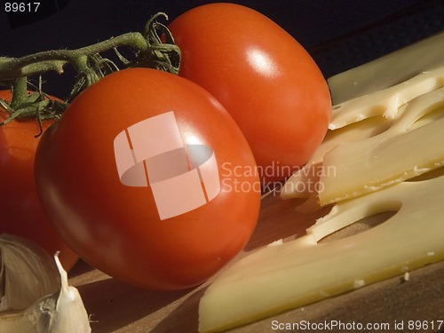 Image of Tomatoes, garlic and cheese