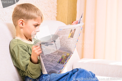 Image of Boy with newspaper