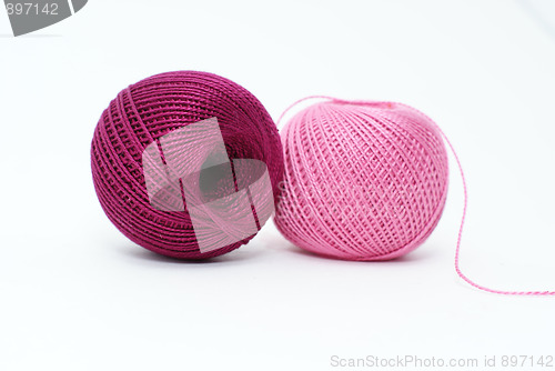 Image of knitting with pink and purple yarn