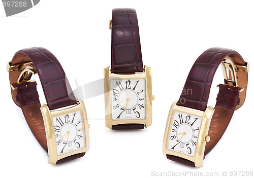 Image of Three Golden Wristwatches isolated