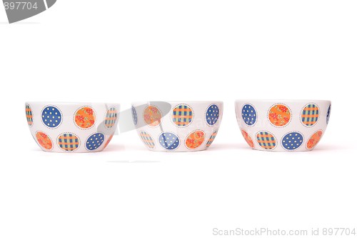 Image of Row of three porcelain bowls isolated