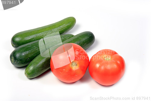 Image of Tasty kitchen. Fresh vegetables isolated on white