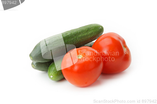 Image of Tasty kitchen. Fresh vegetables isolated on white