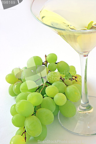 Image of Very sweet white wine in the martini glasses isolated on white 