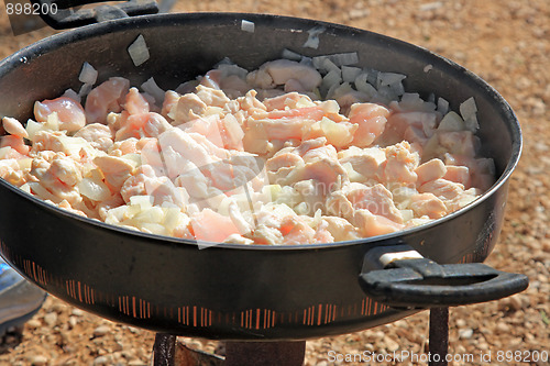 Image of The cooking. 
