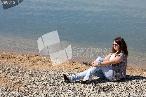 Image of A young girl on the beach