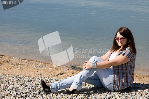 Image of A young girl on the beach