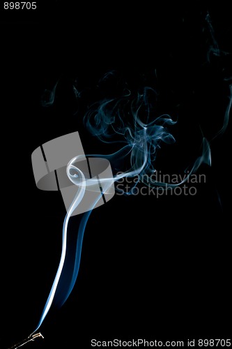 Image of dancing smoke abstract on black