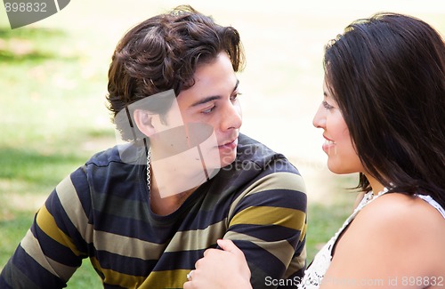 Image of Attractive Hispanic Couple At The Park