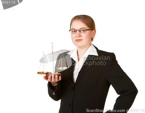 Image of young business woman with scales