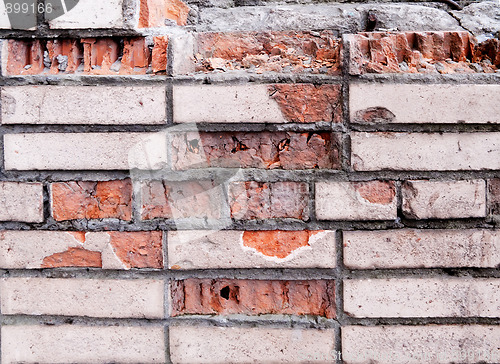 Image of Old damaged brick wall