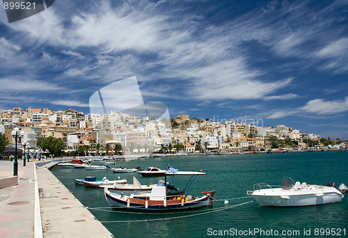 Image of Sea bay, promenade in Mediterranean town and cirrus clouds