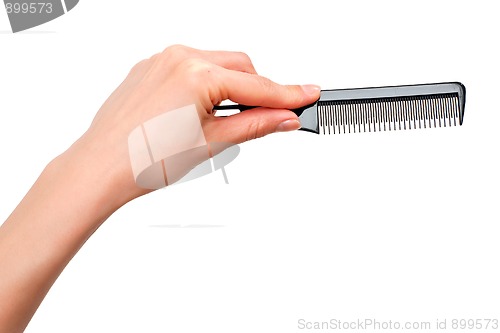 Image of Comb in the hand