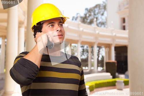 Image of Handsome Hispanic Contractor with Hard Hat