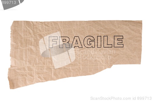 Image of grunge paper with fragile text