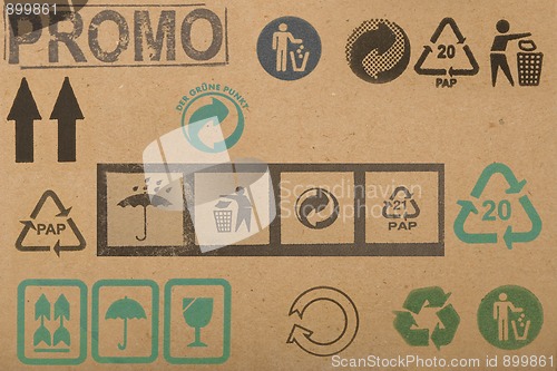 Image of different symbols from cardboard boxes 