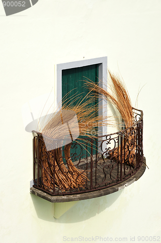 Image of balcony at old house in Madeira with package of wicker