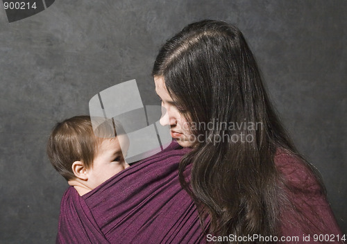 Image of Mother with her daughter in sling