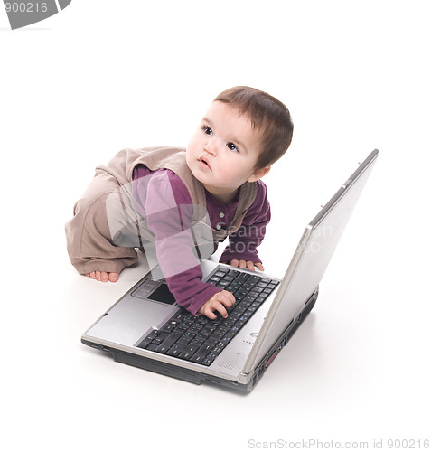 Image of Baby girl with a laptop