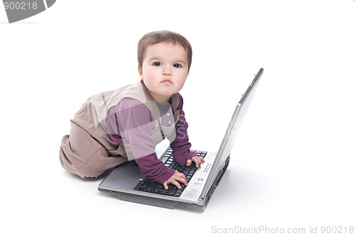 Image of Baby girl with a laptop