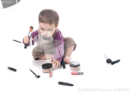 Image of Baby girl with cosmetics