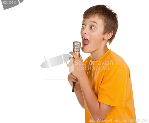 Image of boy with microphone and lots of copyspace