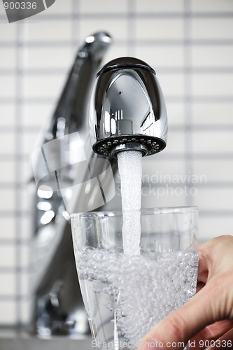 Image of Filling glass of tap water