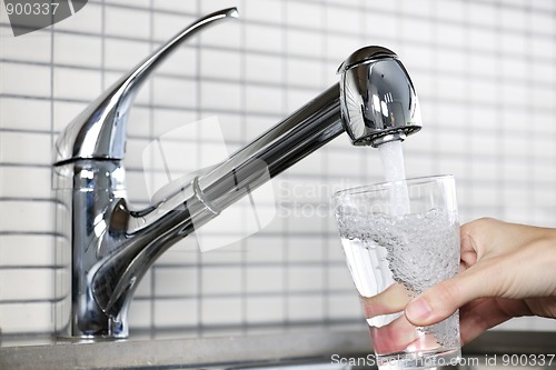 Image of Filling glass of tap water