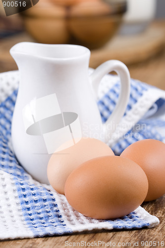 Image of brown eggs and milk