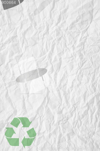 Image of white crumpled paper and recycling sign