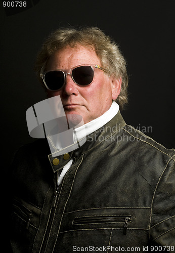 Image of handsome middle age senior man motorcycle jacket