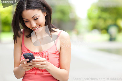 Image of Woman texting