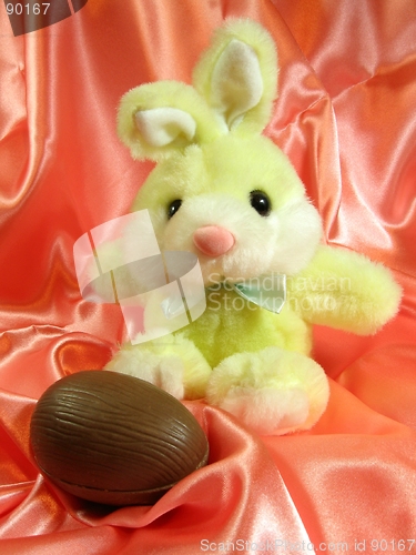 Image of Easter bunny with chocolate egg