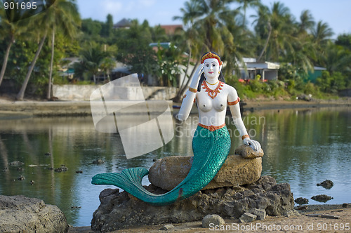 Image of mermaid on rock on samui island