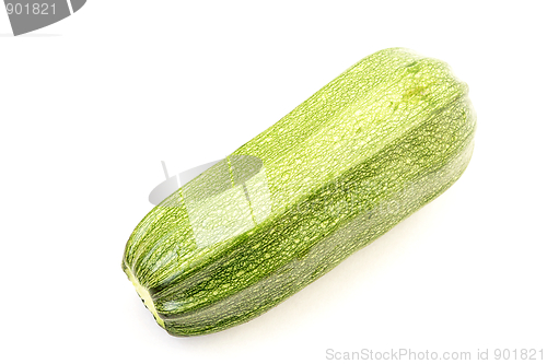 Image of Single green zucchini isolated on white