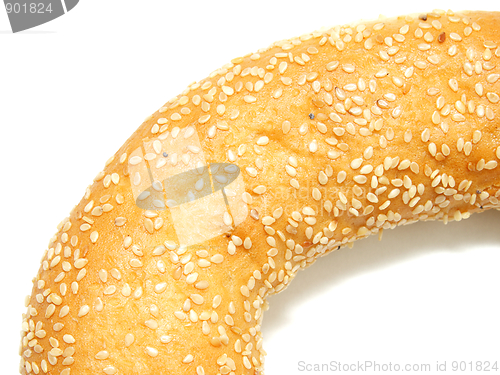 Image of A part of bagel with sesame seeds