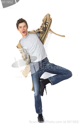 Image of Young man balancing isolated over a white background 