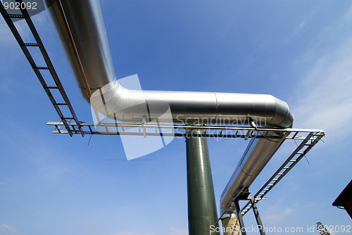 Image of Industrial zone, Steel pipe-lines on blue sky