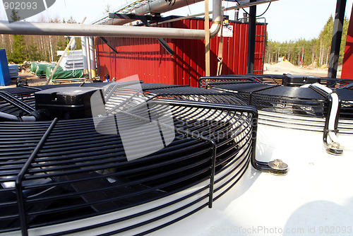 Image of Industrial zone, Steel pipe-lines on blue sky