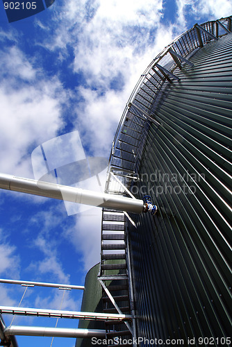 Image of Industrial zone, Steel pipelines on blue sky 